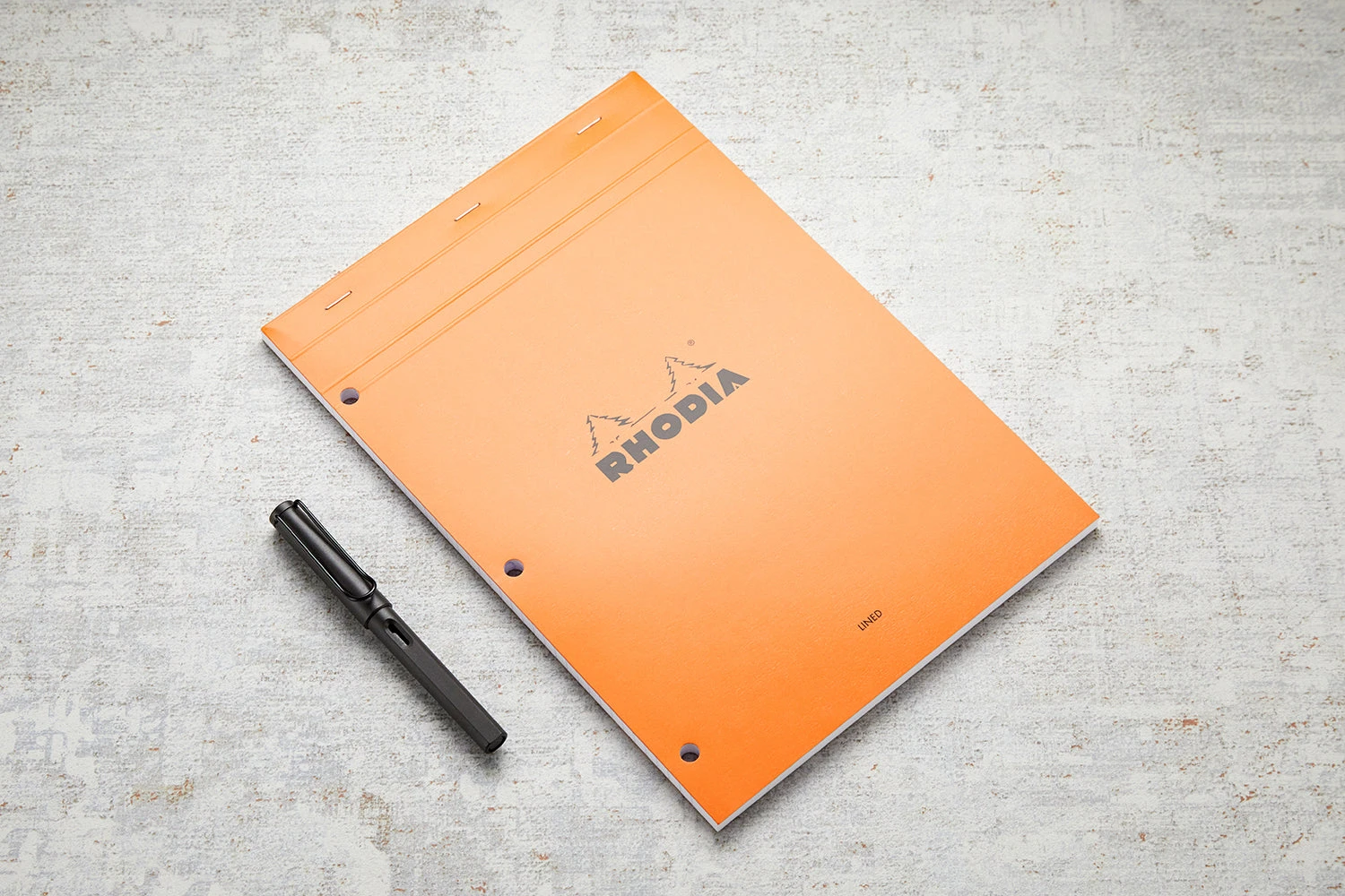 Rhodia No. 18 A4 Notepad - Orange, Lined With 3-Hole Punch 6 Rhodia No. 18 A4 Notepad - Orange, Lined With 3-Hole Punch - Image 6